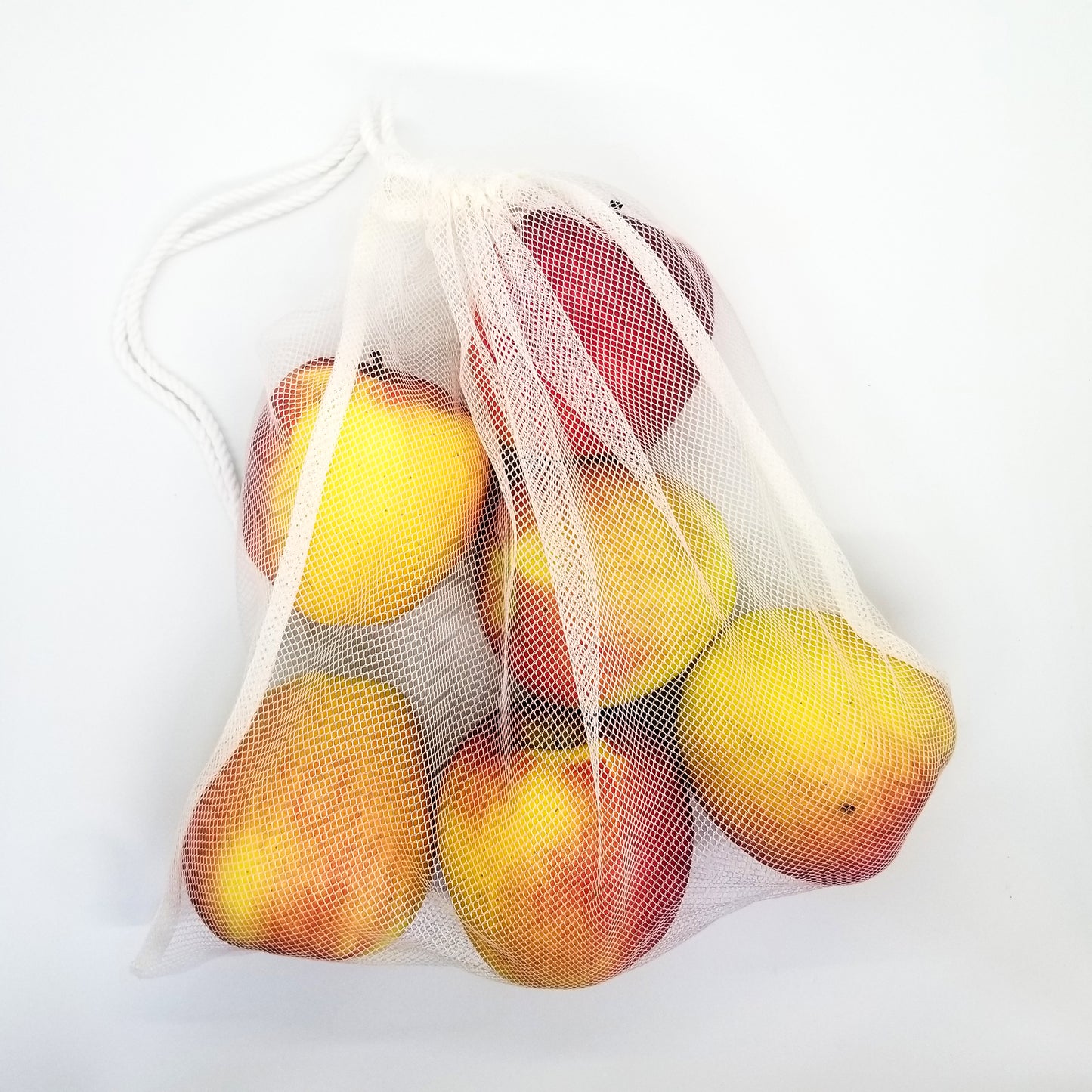 mesh produce bag full of apples