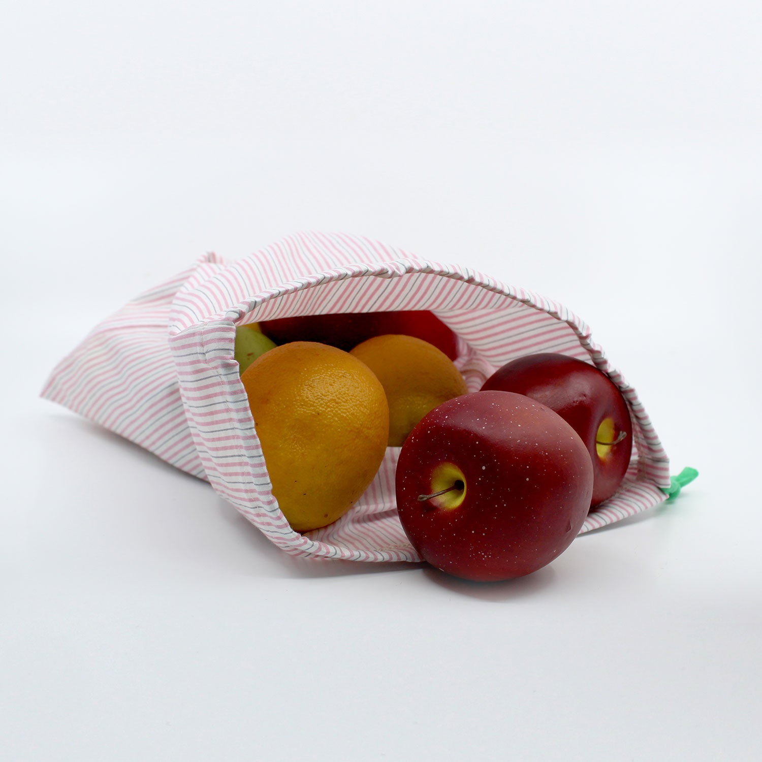 upcycled produce bag with fruit spilling out