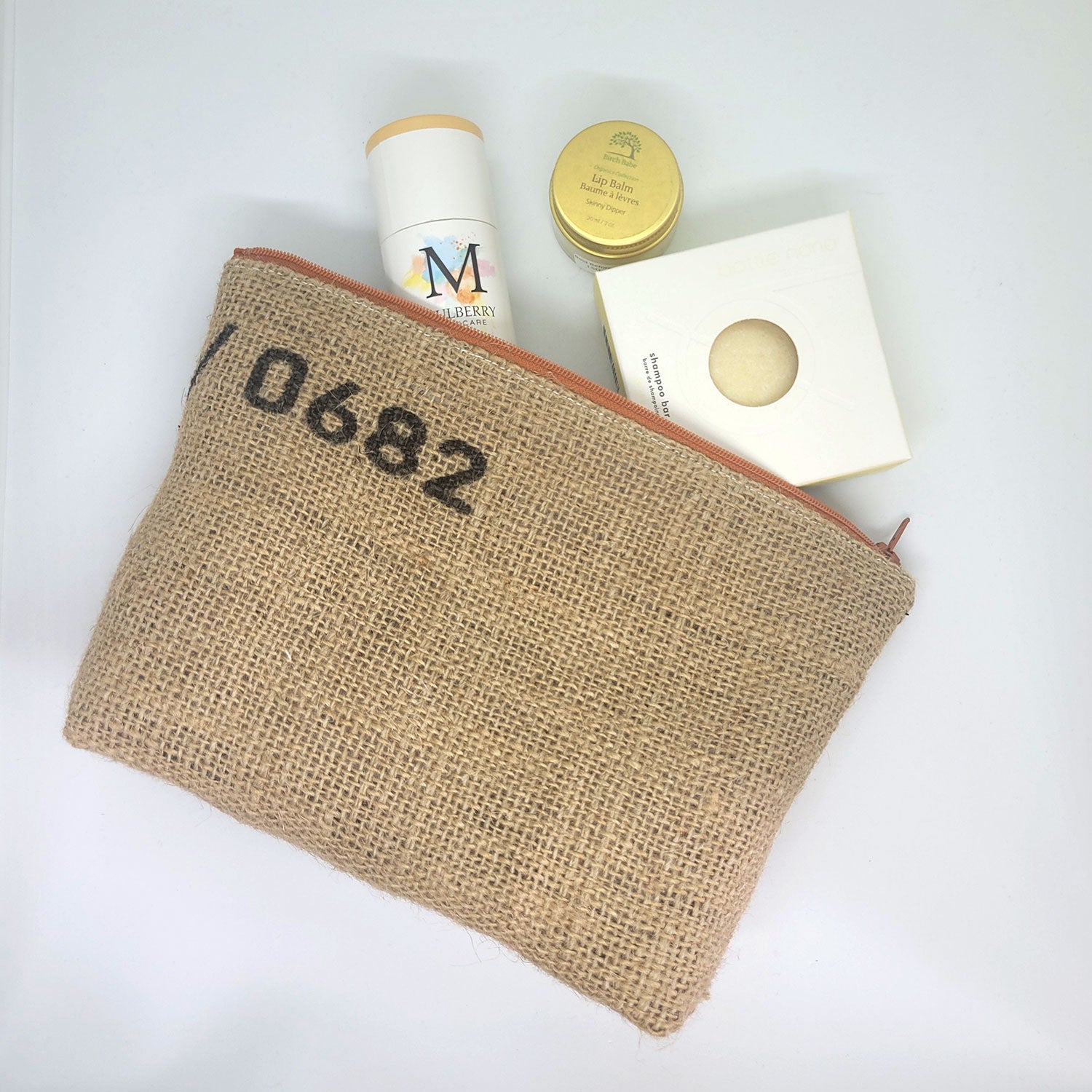 upcycled coffee sack pouch with toiletries